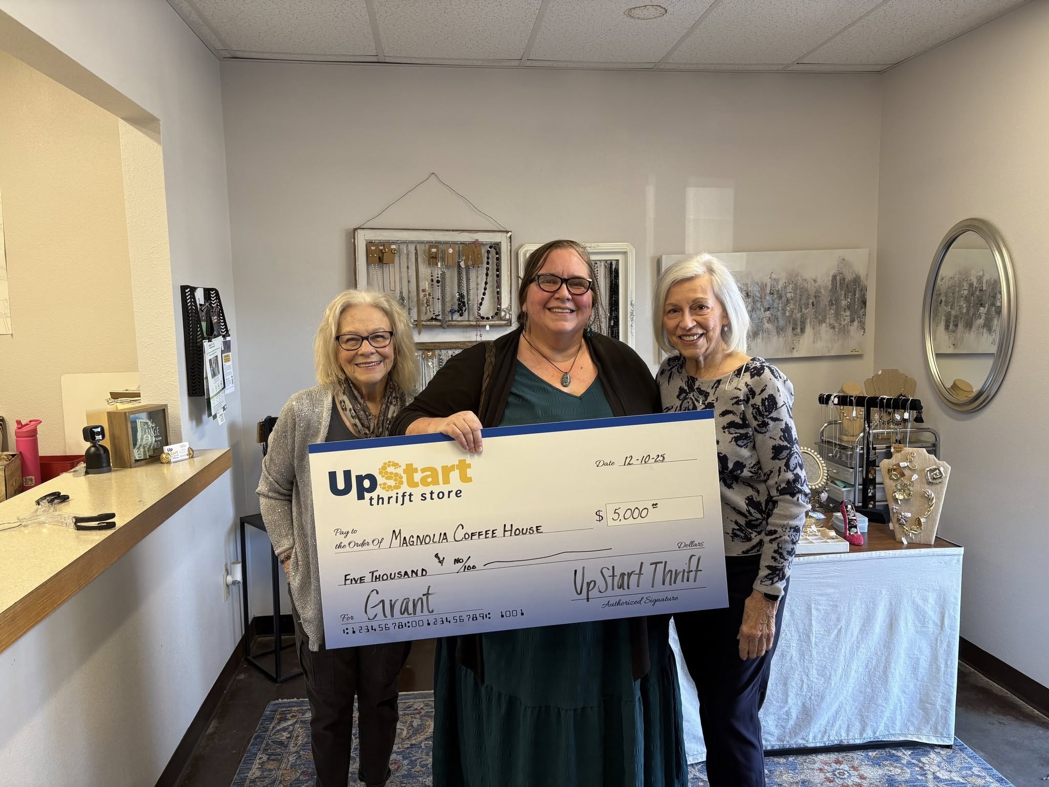 Magnolia Coffee House receiving their $5,000 UpStart grant
